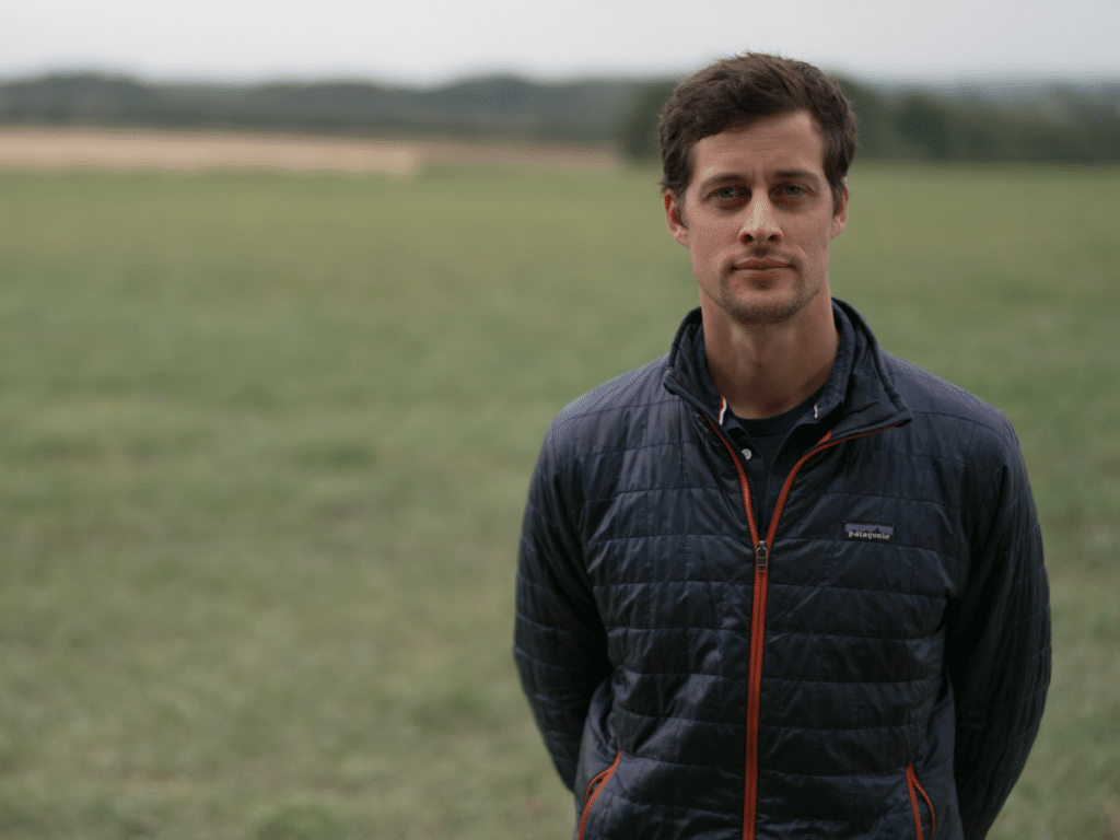 Land App Founder, Tim Hopkin stood in a field